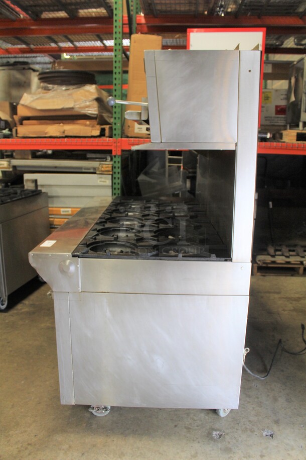 AMAZING! Garland Model M43RC Commercial Stainless Steel Natural Gas 10 Burner Range With Double Ovens (1 CONVECTION), And Salamander/Broiler/Cheese Melter  On Commercial Casters. 68x34x68  - Image 8 of 11