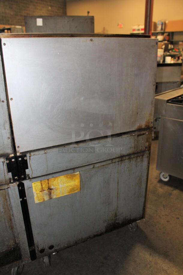 AMAZING! Garland Model M43RC Commercial Stainless Steel Natural Gas 10 Burner Range With Double Ovens (1 CONVECTION), And Salamander/Broiler/Cheese Melter  On Commercial Casters. 68x34x68  - Image 11 of 11