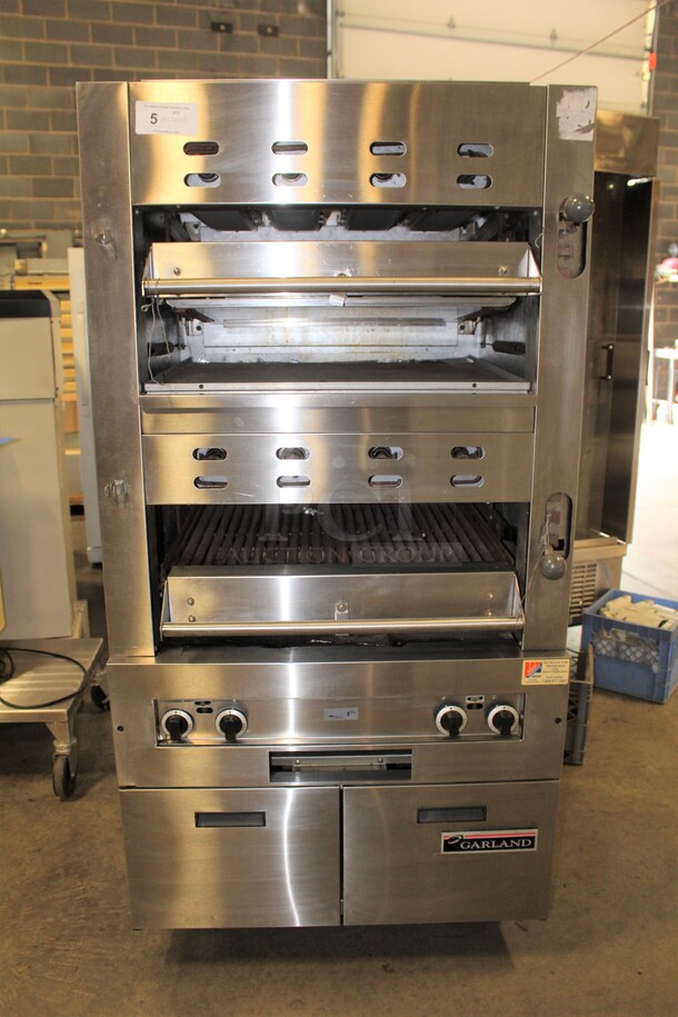 FANTASTIC! Garland Model M110X Commercial Stainless Steel Natural Gas Double Upright Broiler/Salamander/Cheese Melter On Commercial Casters. 34x36x68.