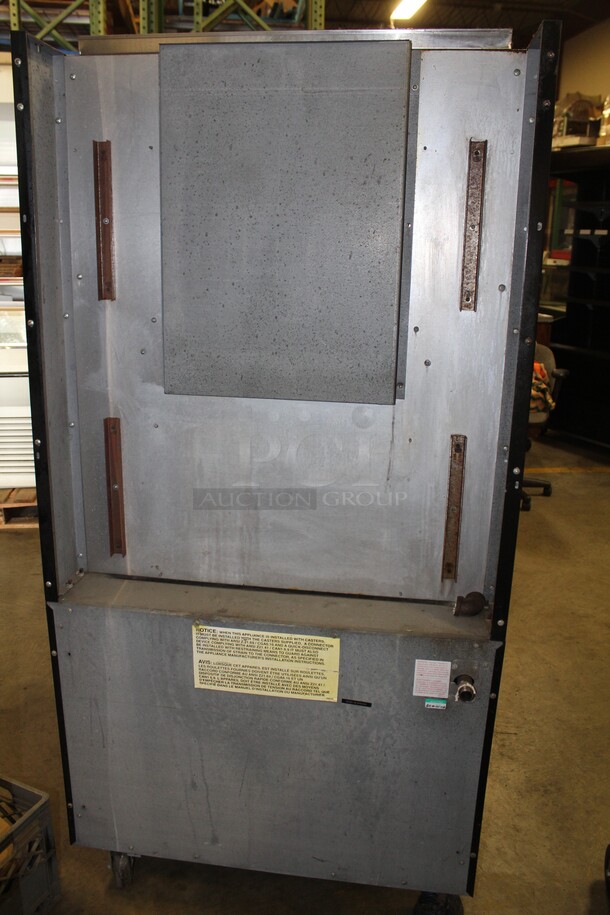 FANTASTIC! Garland Model M110X Commercial Stainless Steel Natural Gas Double Upright Broiler/Salamander/Cheese Melter On Commercial Casters. 34x36x68. - Image 6 of 7