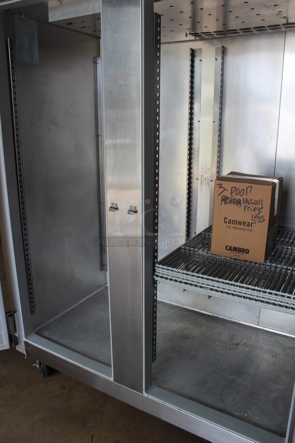 SUPER FIND! McCall Model 7-7070T Commercial Stainless Steel Triple Solid Door Reach In Refrigerator/Cooler On Commercial Casters. 83x34x84. 115V/60Hz. 1 Phase. Working When Pulled! - Image 2 of 8
