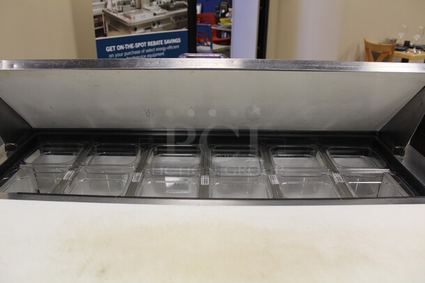 GREAT FIND! True Model TSSU-48-12 Commercial Stainless Steel Two Door Refrigerated Sandwich/Salad Prep Table On Commercial Casters With Commercial Plastic Inserts. 48x30.5x42.5. 115V/60Hz. Working When Pulled!  - Image 2 of 7