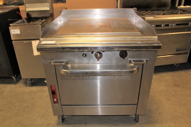 SUPER FIND! Commercial Stainless Steel Natural Gas Oven With Griddle Top On Commercial Casters. 36x37.5x38.5