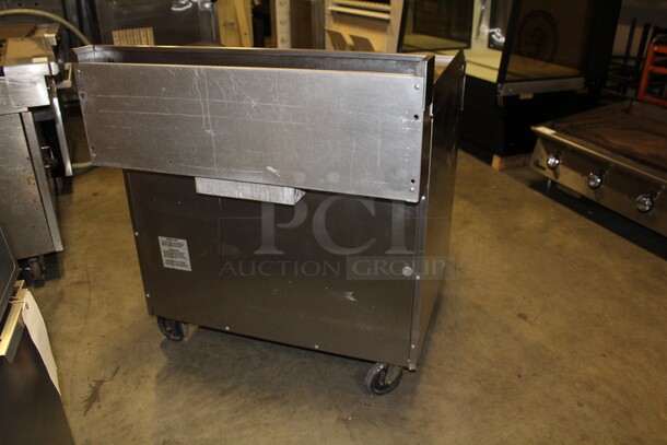 SUPER FIND! Commercial Stainless Steel Natural Gas Oven With Griddle Top On Commercial Casters. 36x37.5x38.5 - Image 4 of 6