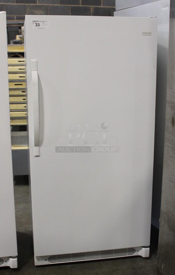 GREAT FIND! Frigidaire Model FRU17B2JW22 Upright Freezer. 32x26x65.5. 115V/60Hz. Working When Pulled