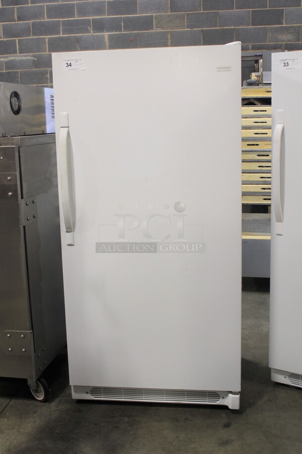 GREAT FIND! Frigidaire Model FRU17B2JW22 Upright Freezer. 32x26x65.5. 115V/60Hz. Working When Pulled - Image 1 of 8
