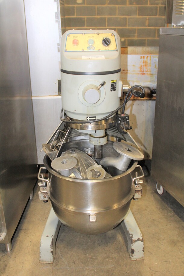 AWESOME! Globe Model SP60P-3 Commercial 60qt. Planetary Mixer With Commercial Stainless Steel Bowl, Bowl Guard, Whisk Attachment, 2 Paddle Attachments, And 2 Dough Hooks. 24x26.5x51.5. 208V/60Hz. 3 Phase. Working When Pulled!