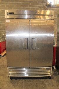 SUPER! True Model T-49 Commercial Stainless Steel Two Door Reach In Refrigerator/Cooler On Commercial Casters. 54x29.5x83. 115V/60Hz. Working When Pulled!