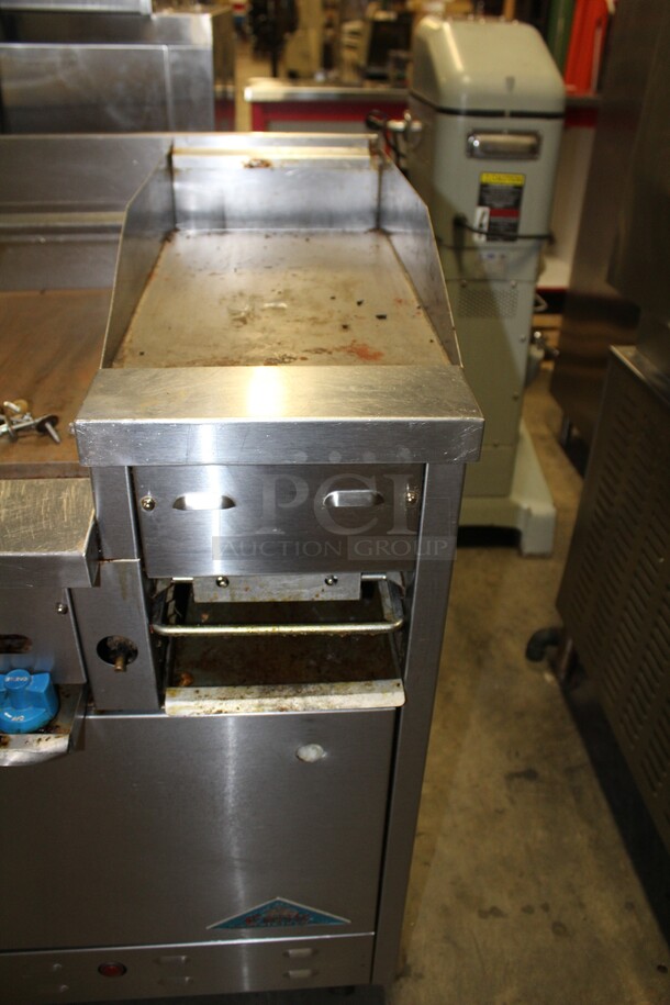 GREAT! Castle Commercial Stainless Steel Natural Gas Double Oven With Griddle, 2 Burners And Holding Station On Commercial Casters. 48x30x45  - Image 4 of 10