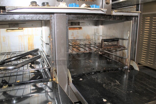GREAT! Castle Commercial Stainless Steel Natural Gas Double Oven With Griddle, 2 Burners And Holding Station On Commercial Casters. 48x30x45  - Image 6 of 10
