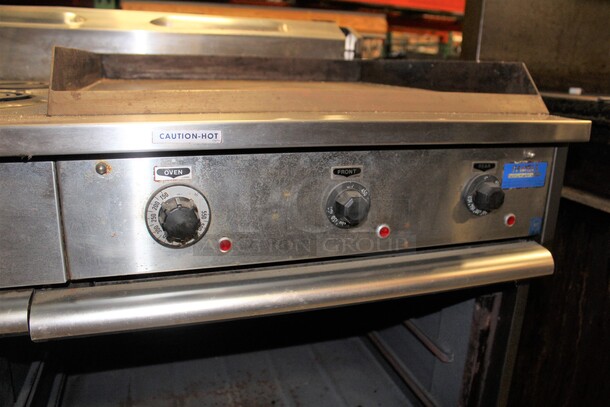 GREAT FIND! Garland Commercial Stainless Steel Electric Double Oven With Griddles And Two Burners. 60x31.5x43 - Image 5 of 8