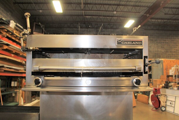 FABULOUS! Garland Commercial Stainless Steel Natural Gas 6 Burner Range With Double Ovens, Griddle And Salamander/Broiler/Cheese Melter. 85x38x67.5 - Image 5 of 11