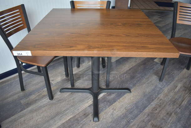 Wood Pattern Table on Black Metal Table Base. Stock Picture - Cosmetic Condition May Vary. 36x36x30