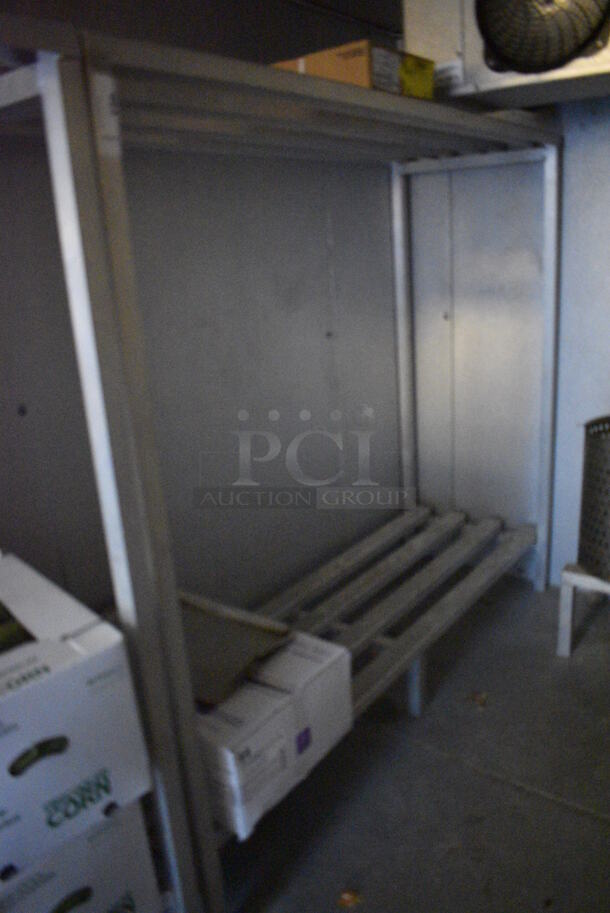 Metal 2 Tier Dunnage Style Shelving Unit. Does Not Include Contents. 72x24x64. BUYER MUST DISMANTLE. PCI CANNOT DISMANTLE FOR SHIPPING. PLEASE CONSIDER FREIGHT CHARGES.