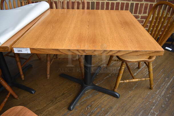 Wood Pattern Table on Black Metal Table Base. Stock Picture - Cosmetic Condition May Vary. 36x36x30