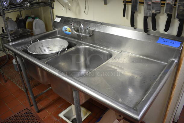 Stainless Steel Commercial 2 Well Sink w/ Right Side Drainboard, Faucet and Handles. This Unit Will Be Professionally Uninstalled. 57x28x44. Bays 12x20x14. Drainboard 16x23x2 - Image 2 of 4