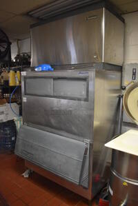 ALL ONE MONEY! Lot of Scotsman Stainless Steel Commercial Ice Machine Head on Follett Stainless Steel Commercial Ice Bin and Remote Condenser. This Unit Will Be Professionally Uninstalled. 48x39x93. Tested and Working!