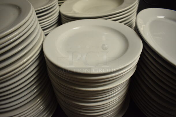 24 White Ceramic Round Plates. 9x9x1. 24 Times Your Bid! - Image 1 of 3