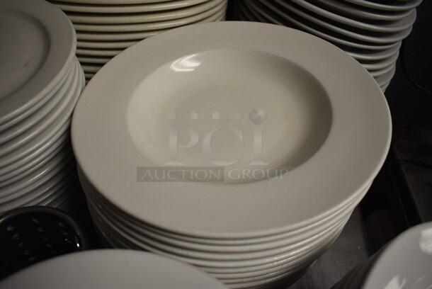 21 White Ceramic Pasta Plates. 12x12x2. 21 Times Your Bid!