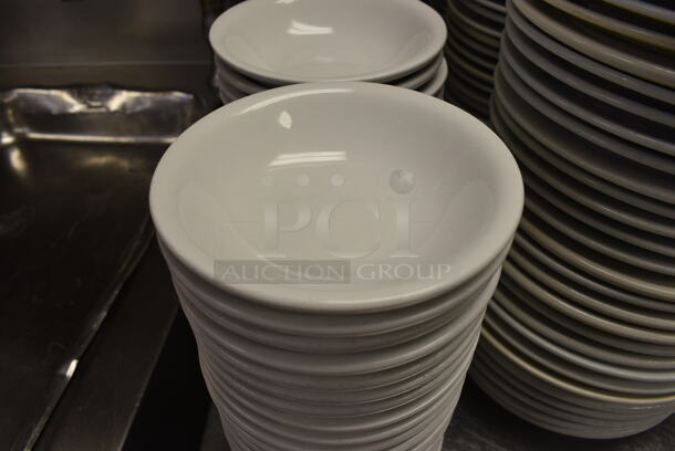 10 White Ceramic Bowls. 5x5x1. 10 Times Your Bid!