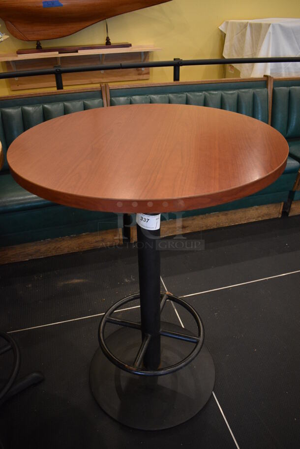 Round Wood Pattern Bar Height Table on Black Metal Table Base w/ Footrest. Stock Picture - Cosmetic Condition May Vary. 30x30x42