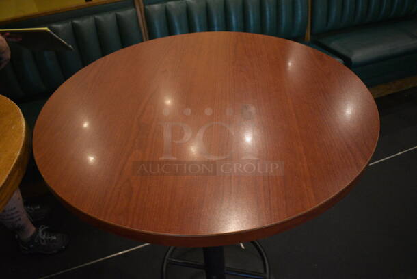 Round Wood Pattern Bar Height Table on Black Metal Table Base w/ Footrest. Stock Picture - Cosmetic Condition May Vary. 30x30x42 - Image 2 of 3