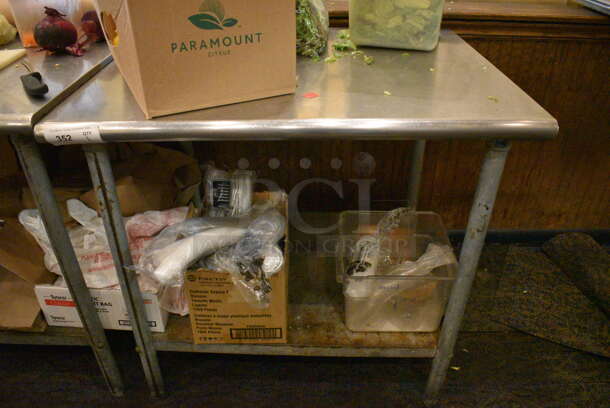 Stainless Steel Commercial Table w/ Metal Undershelf. Does Not Include Contents. 36x30x34
