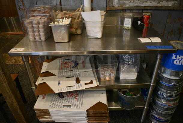 Stainless Steel Commercial Table w/ 2 Stainless Steel Undershelves. Does Not Include Contents. 48x24x41
