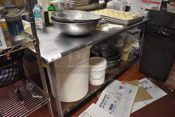 Stainless Steel Commercial Table w/ Metal Undershelf. Does Not Include Contents. 72x30x40
