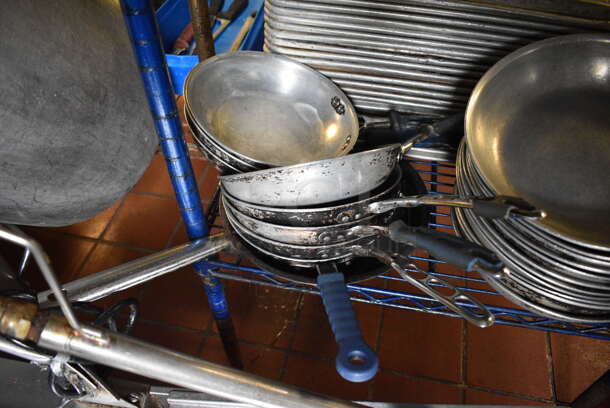 9 Metal Skillets. 15x8.5x2. 9 Times Your Bid!