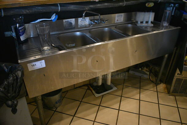 Stainless Steel Commercial 3 Bay Sink w/ Dual Drainboards, Faucet and Handles. This Unit Will Be Professionally Uninstalled. 60x19x34