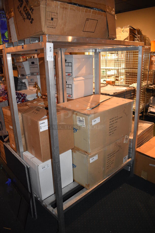 Metal 2 Tier Dunnage Style Shelving Unit. Does Not Include Contents. 48x24x64. BUYER MUST DISMANTLE. PCI CANNOT  DISMANTLE FOR SHIPPING. PLEASE CONSIDER FREIGHT CHARGES. - Image 1 of 2