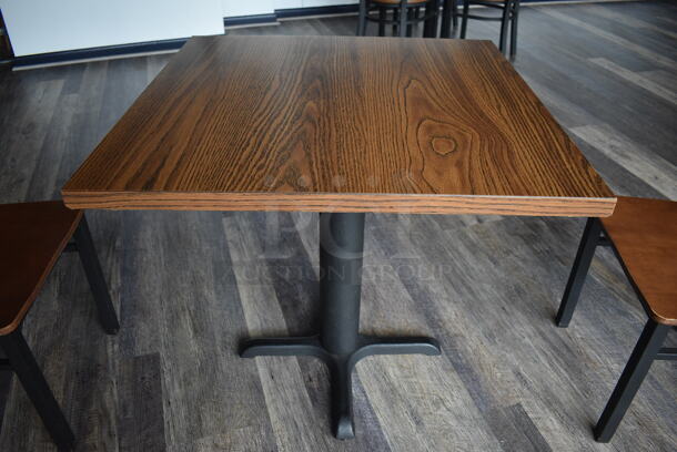 Wood Pattern Table on Black Metal Table Base. Stock Picture - Cosmetic Condition May Vary. 30x30x30