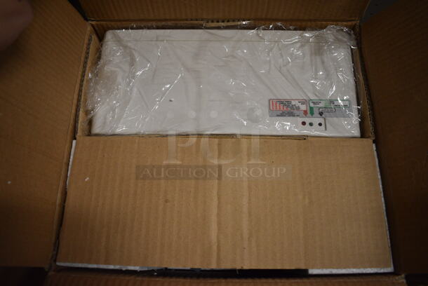 BRAND NEW IN BOX! DualLite Model CVEC100-12VI Commercial Emergency Light and Hubbell Battery. 12.5x8.5x6, 6.5x7x5 - Image 1 of 7
