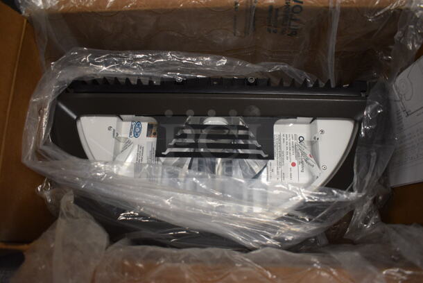 BRAND NEW IN BOX! Cooper Lighting Model 104W50HQUDBRP Metal Light. 120/208/240/277 Volts. 18x9x7