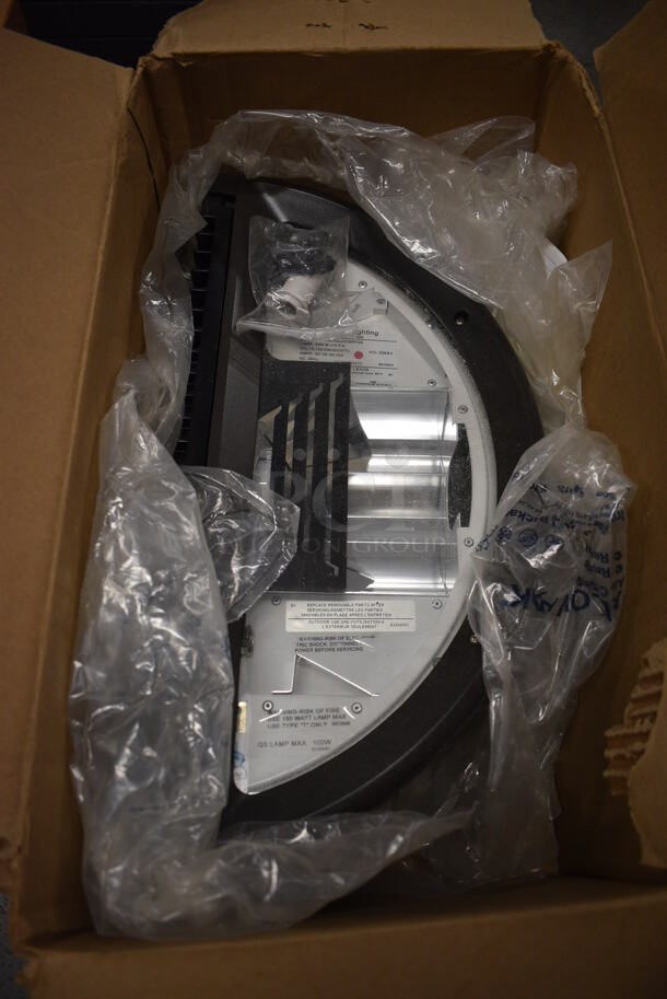 BRAND NEW IN BOX! Cooper Lighting Model 104W50HQUDBRP Metal Light. 120/208/240/277 Volts. 18x9x7