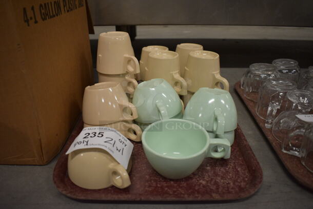 21 Poly Mugs on Brown Tray. Includes 4x3x3. 21 Times Your Bid! - Image 1 of 3