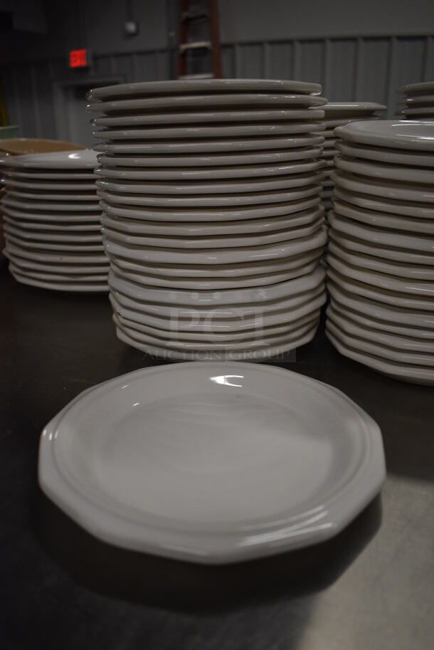 23 White Ceramic Plates. 7x7x1. 23 Times Your Bid!