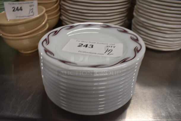 12 White Ceramic Plates w/ Pattern on Rim. 7x7x1. 12 Times Your Bid!