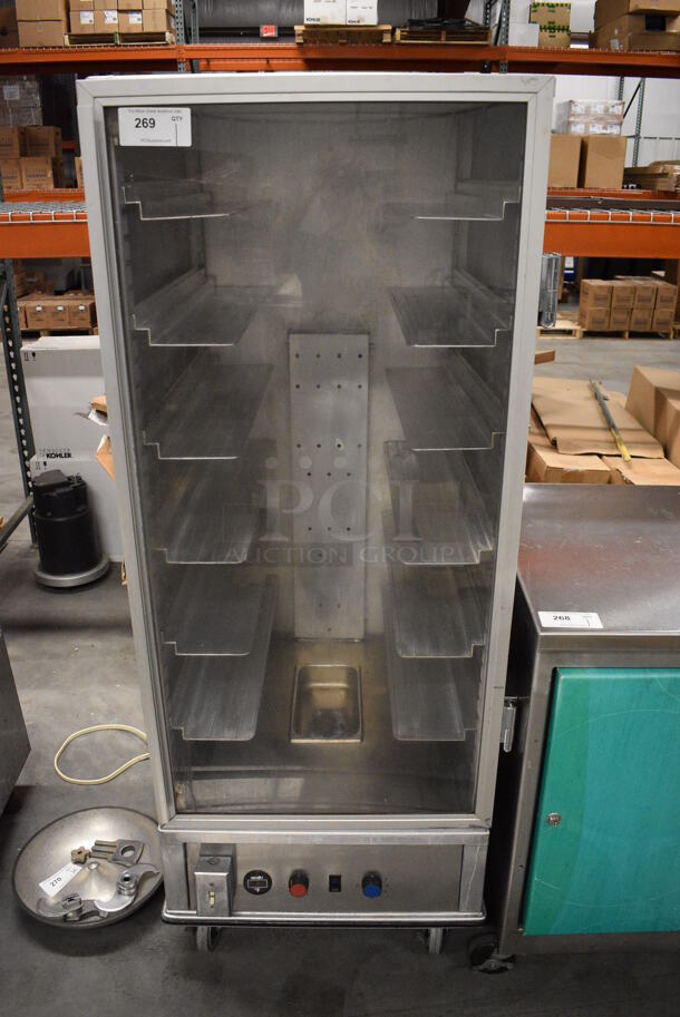 Metal Commercial Warming Cabinet on Commercial Casters. 27x32x69