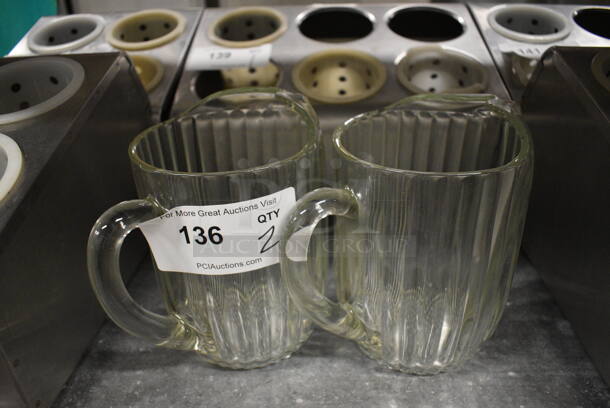 2 Glass Pitchers. 8x5.5x8. 2 Times Your Bid!