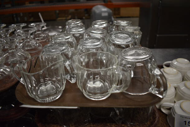 36 Cream Pourers on 3 Brown Trays. 4.5x3x3, 5.5x3x3. 36 Times Your Bid!