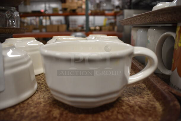 7 White Ceramic Mugs on Brown Tray. 5x4x2.5. 7 Times Your Bid!
