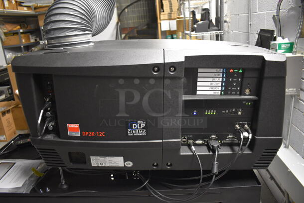 MARVELOUS! 2014 Barco Model DP2K-12C Commercial Countertop DLP Cinema Projector on Cabinet w/ Film-Tech FT21 Automation Cinema System, Gefer Cinema Scaler Pro III and Tripp Lite Surge Protector. 200-240 Volts. See Lot 2 For Additional Pictures! 26x38x22, 24x53x38. BUYER MUST REMOVE. Tested and Working! - Image 2 of 12