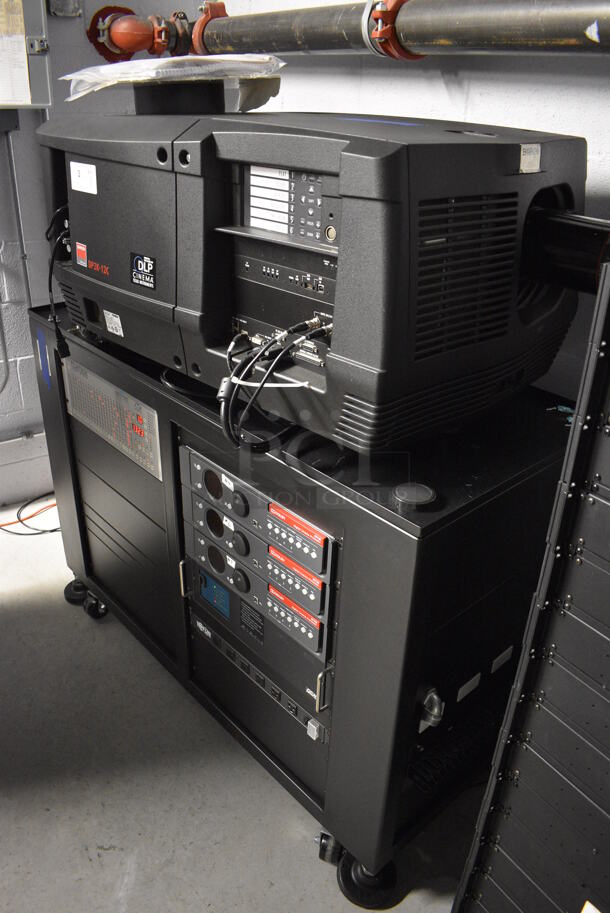 MARVELOUS! 2012 Barco Model DP2K-12C Commercial Countertop DLP Cinema Projector on Cabinet w/ Film-Tech FT21 Automation Cinema System, 4 Dolby CP750 Digital Cinema Processors, DCM Powercom, TV Monitor and Tripp Lite Surge Protector. 200-240 Volts. See Lot 4 For Additional Pictures! 26x38x22, 24x53x38. BUYER MUST REMOVE. Tested and Working! - Image 10 of 12