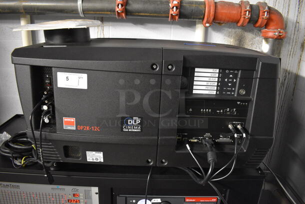 MARVELOUS! 2012 Barco Model DP2K-12C Commercial Countertop DLP Cinema Projector on Cabinet w/ Film-Tech FT21 Automation Cinema System, 4 Dolby CP750 Digital Cinema Processors, DCM Powercom, TV Monitor and Tripp Lite Surge Protector. 200-240 Volts. See Lot 6 For Additional Pictures! 26x38x22, 24x53x38. BUYER MUST REMOVE. Tested and Working! - Image 3 of 12