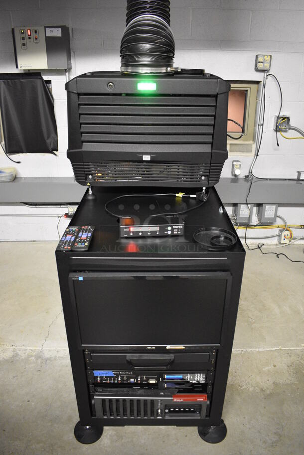 MARVELOUS! 2014 Barco Model DP2K-12C Commercial Countertop DLP Cinema Projector on Cabinet w/ Film-Tech FT21 Automation Cinema System, Gefer Cinema Scaler Pro III, Dolby CP750 Digital Cinema Processor, DCM Powercom, TV Monitor and Tripp Lite Surge Protector. 200-240 Volts. See Lot 8 For Additional Pictures! 26x38x22, 24x53x38. BUYER MUST REMOVE. Tested and Working! - Image 12 of 12
