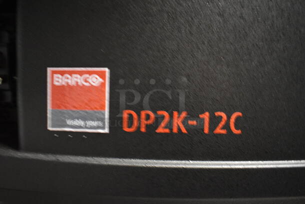 MARVELOUS! 2014 Barco Model DP2K-12C Commercial Countertop DLP Cinema Projector on Cabinet w/ Film-Tech FT21 Automation Cinema System, Gefer Cinema Scaler Pro III, Dolby CP750 Digital Cinema Processor, DCM Powercom, TV Monitor and Tripp Lite Surge Protector. 200-240 Volts. See Lot 10 For Additional Pictures! 26x38x22, 24x53x38. BUYER MUST REMOVE. Tested and Working! - Image 5 of 12
