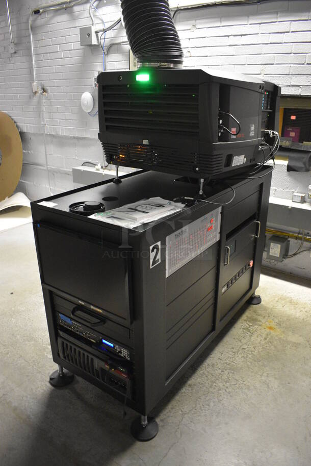MARVELOUS! 2014 Barco Model DP2K-12C Commercial Countertop DLP Cinema Projector on Cabinet w/ Film-Tech FT21 Automation Cinema System, Gefer Cinema Scaler Pro III, Dolby CP750 Digital Cinema Processor, DCM Powercom, TV Monitor and Tripp Lite Surge Protector. 200-240 Volts. See Lot 10 For Additional Pictures! 26x38x22, 24x53x38. BUYER MUST REMOVE. Tested and Working! - Image 9 of 12