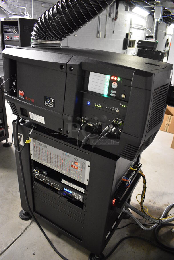 MARVELOUS! 2015 Barco Model DP2K-12C Commercial Countertop DLP Cinema Projector on Cabinet w/ Film-Tech FT21 Automation Cinema System, Gefer Cinema Scaler Pro III, Dolby CP750 Digital Cinema Processor, DCM Powercom, TV Monitor and Tripp Lite Surge Protector. 200-240 Volts. See Lot 14 For Additional Pictures! 26x38x22, 24x53x38. BUYER MUST REMOVE. Tested and Working! - Image 3 of 12